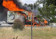 box truck engulfed in flames