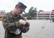 Marine Corps Maj. Scott Vigus with his newborn son