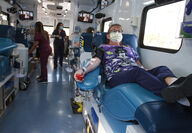 Kathy Cadmus donating blood